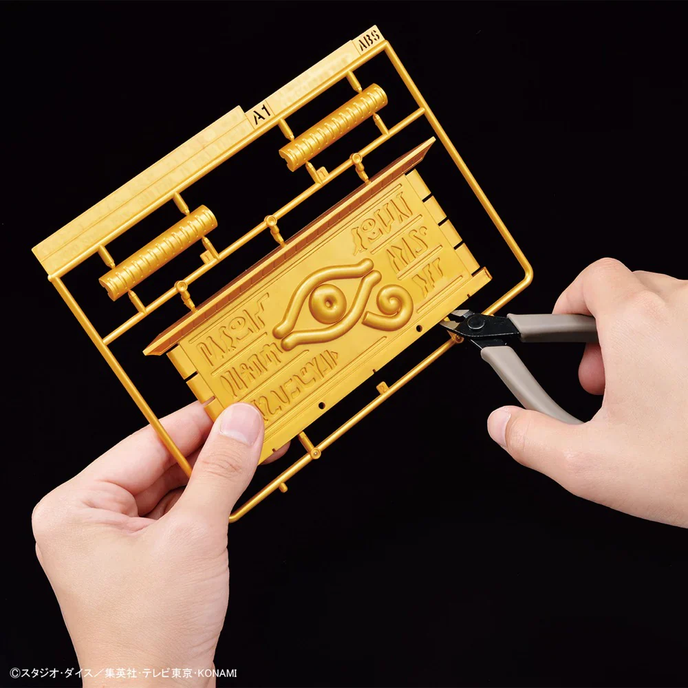Yu-Gi-Oh! Duel Monsters Ultimagear Millennium Puzzle Gold Sarcophagus Model Kit - Bandai - Image 4